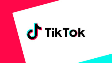 The TikTok logo on a white pink and blue background