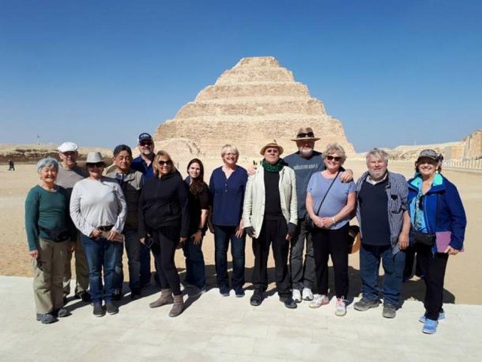 Ancient Origins Tours visited Egypt in February 2020. Here is the happy tour family: Lou, Richard, Marcie, Ken, Brian, Luminous, Alicia, Faye, Andrew, Steve, Aila, Lisle, and Mary Lou in front of Djoser’s pyramid.