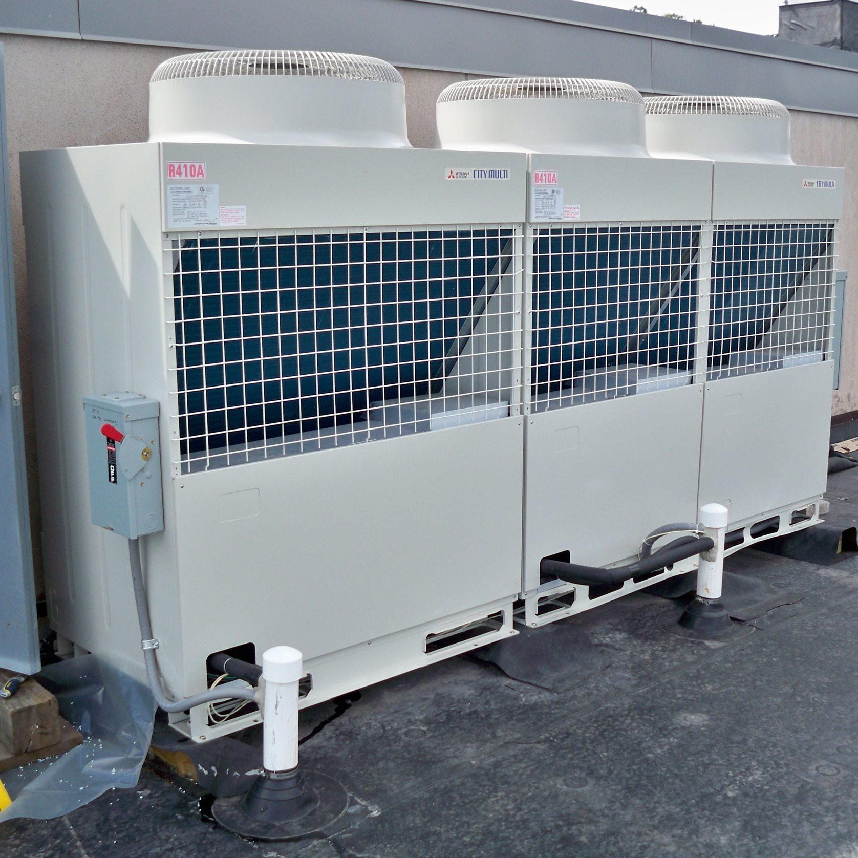 Upgrade rooftop air handler unit for existing commercial building.