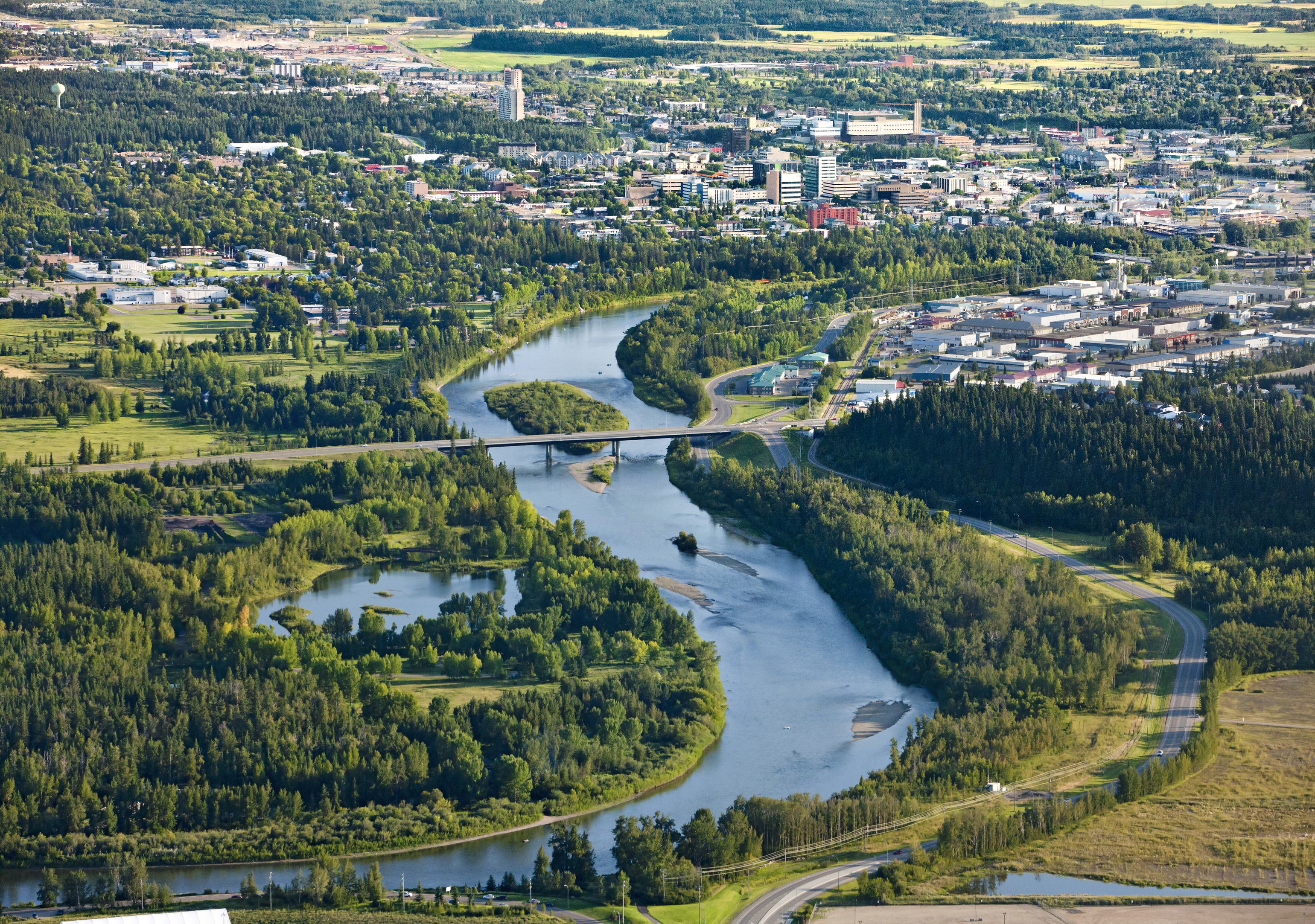 Beautiful summer aerial shot of Red Deer river flowing through Red Deer.