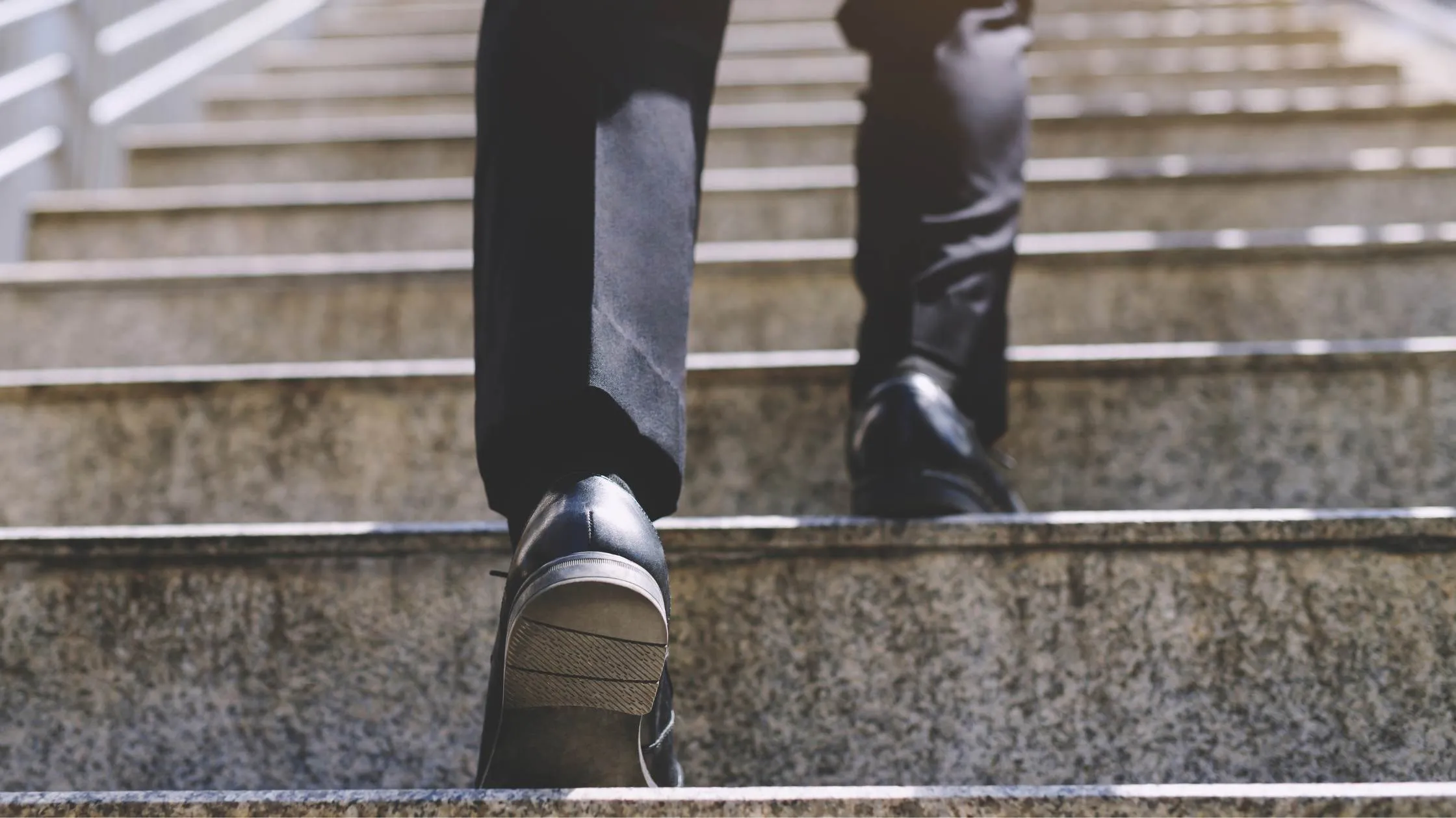 man climbing steps 