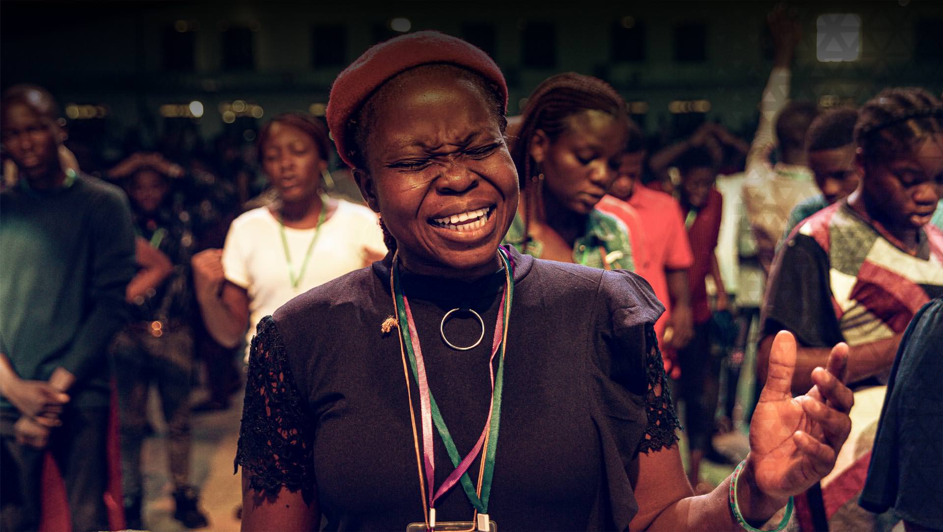 Woman singing in a choir