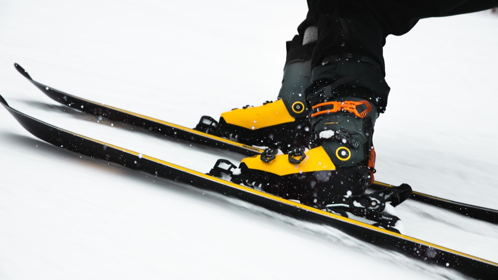 Ski boots attached to skis