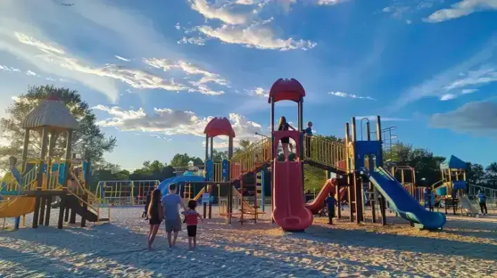 Children enjoying the Science Playground at Sugar Sand Park, Boca Raton, highlighting family-friendly attractions