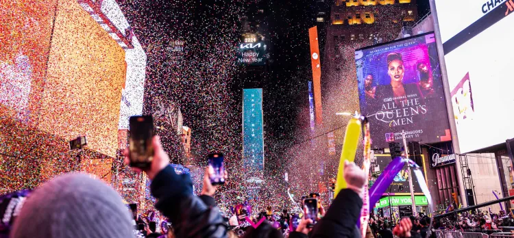 A photo of a group of people in Times Square for NYE