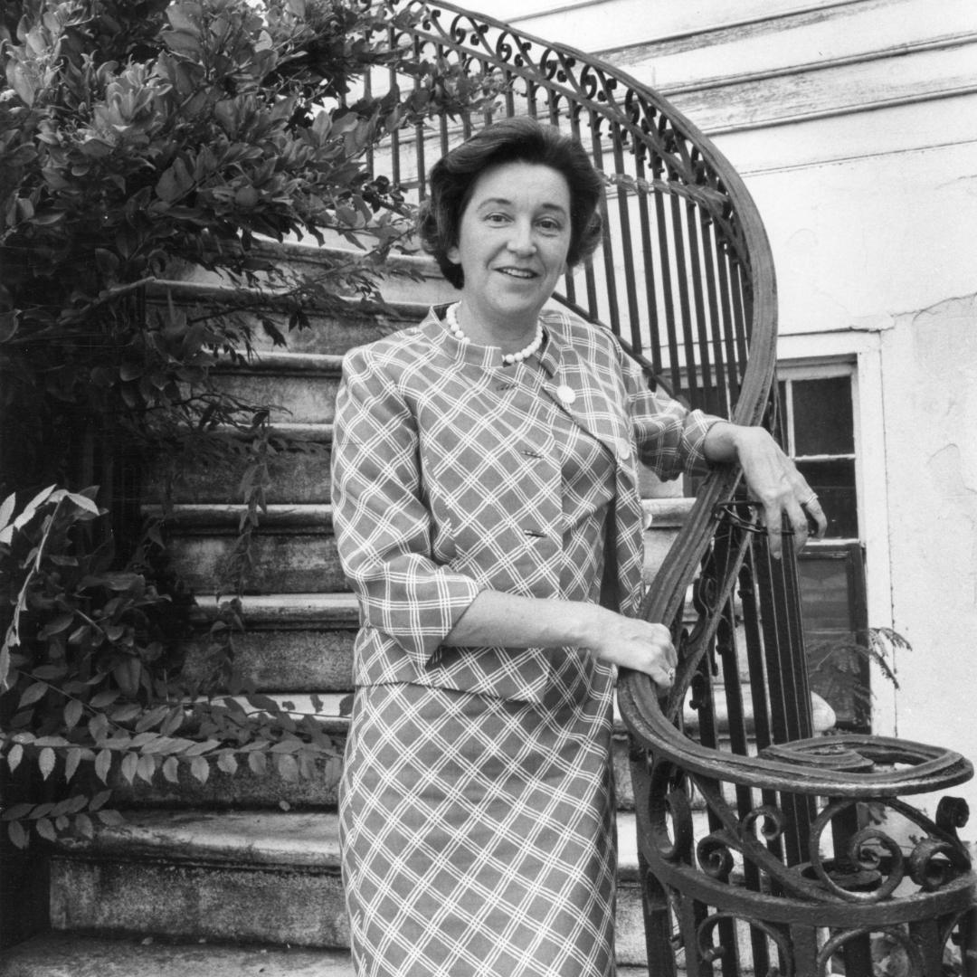 Frances R. Edmunds stands on the porch of an Anson Street Property, c. 1950s.