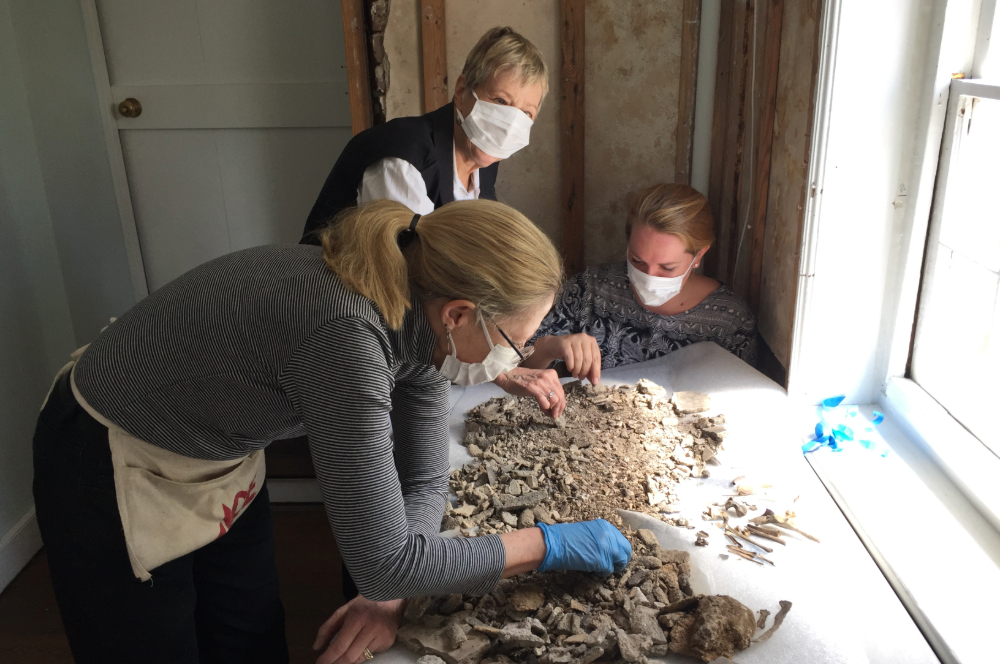 The Nathaniel Russell Kitchen House Project begins with an archaeological investigation of the former space with experts, Ed Chappell (architectural historian), Susan Buck (paint analyst), and David Hoffman (historic contractor) working together to carry out forensic investigation in the kitchen building. This investigation continues in 2024. 