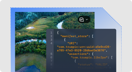 Aerial view of fields and rivers with Content Credentials indicator in top right with software code snippet overlay.