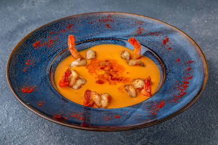 Pumpkin cream soup with shrimps