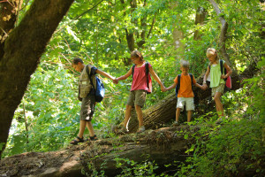 Kids hiking in forest. Credit: American Forests.