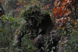 Marine Wearing MultiCam Ghillie Suit