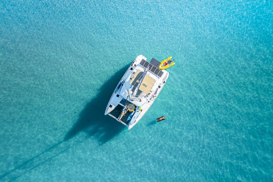 A catamaran in bright blue waters of the Whitsundays