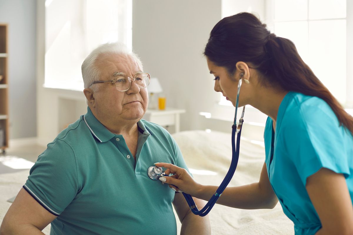 Older obese man receives checkup | Image Credit: © Studio Romantic - stock.adobe.com