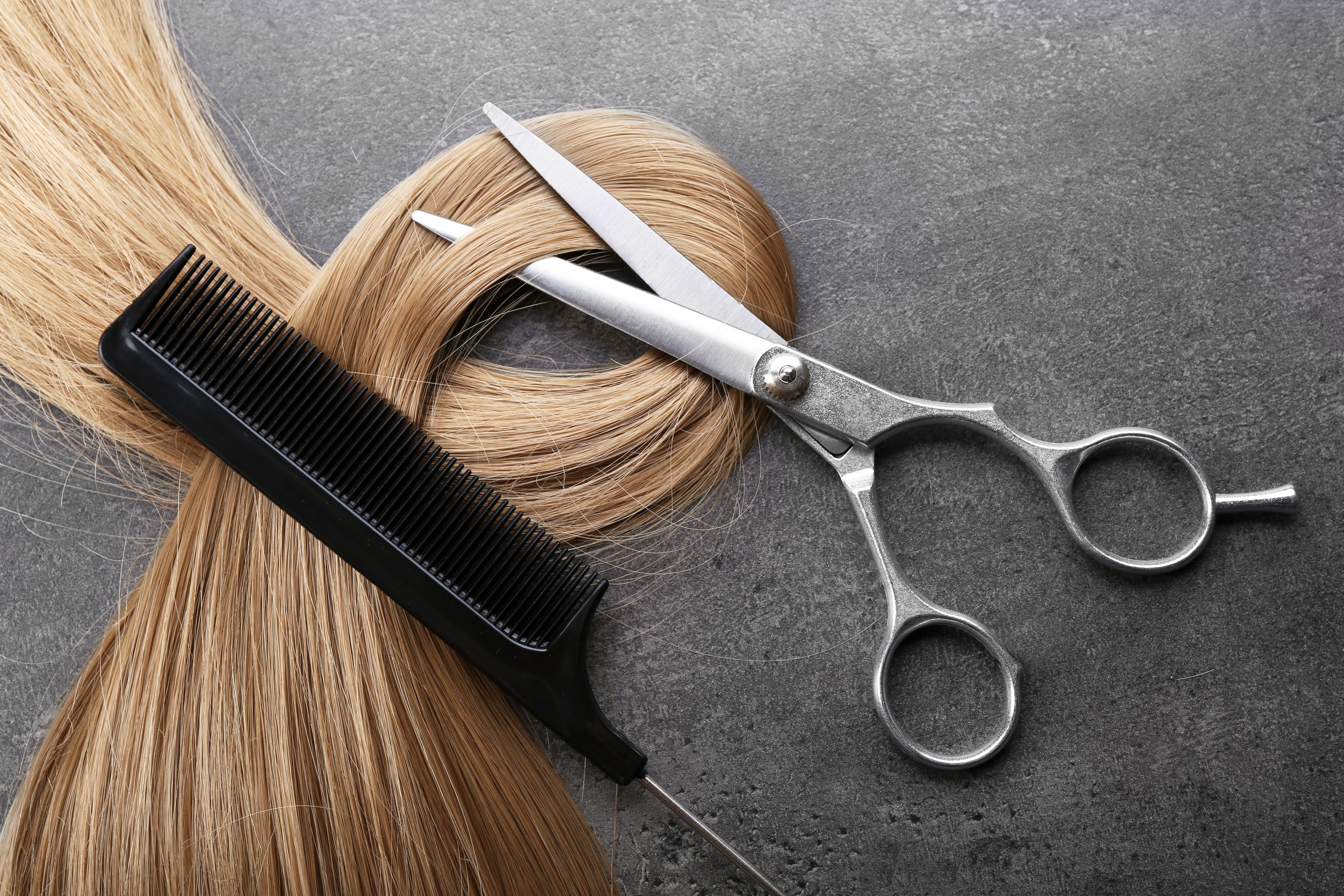 Image of hair and scissors.