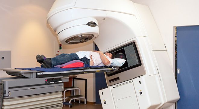 Image of a man receiving radiation therapy for prostate cancer.