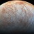 The surface of Europa looms large in this newly-reprocessed color view; image scale is 1.6 km per pixel; north on Europa is at right. Image credit: NASA / JPL-Caltech / SETI Institute.