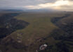 Aerial photo of the Dmanisis Gora site, showing the location at the convergence of two gorges; the 2023 excavations of the inner fortress are visible in foreground. Image credit: Nathaniel Erb-Satullo.