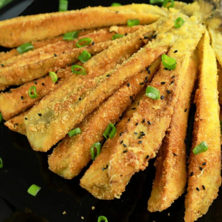 fried eggplant on black plate