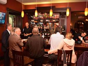 people enjoying the bar