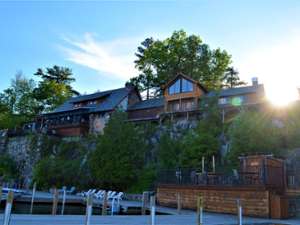 view of blue water manor from the docks below