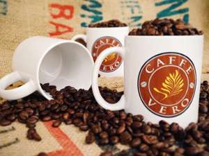 coffee cups filled with coffee beans