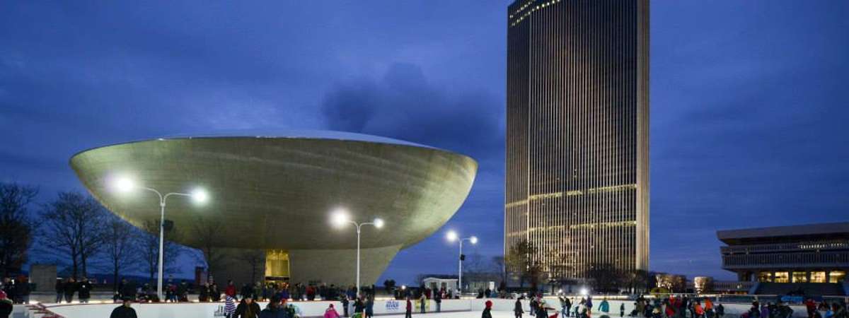 people skating with the egg in the background