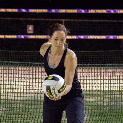 BBQGuys employee about to serve a volleyball