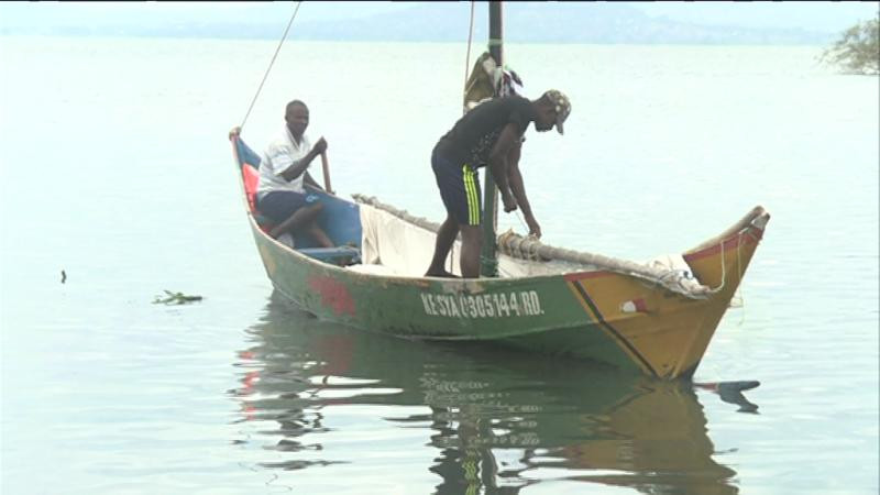 At Luanda Kotieno, fishermen stand guard to protect breeding sites