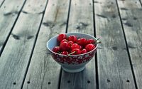 Cherries in a bowl on a wooden table wallpaper 1920x1200 jpg