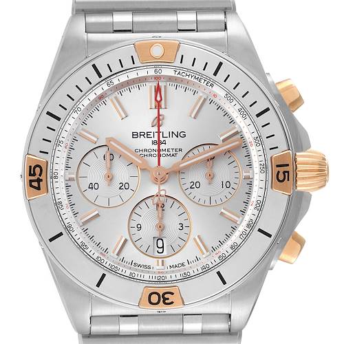 The image shows a front view of the Breitling Chronomat watch, highlighting the dial, bezel, and chronograph subdials.