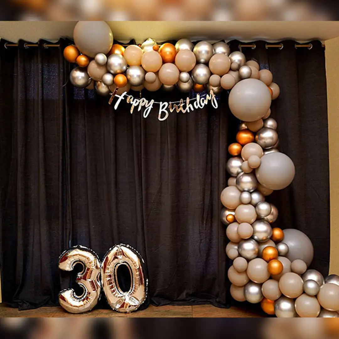 Celebrate birthdays in style with this silver balloon decor idea.