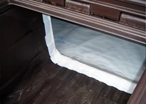 A crawl space door and crawl space vapor barrier integrated together.