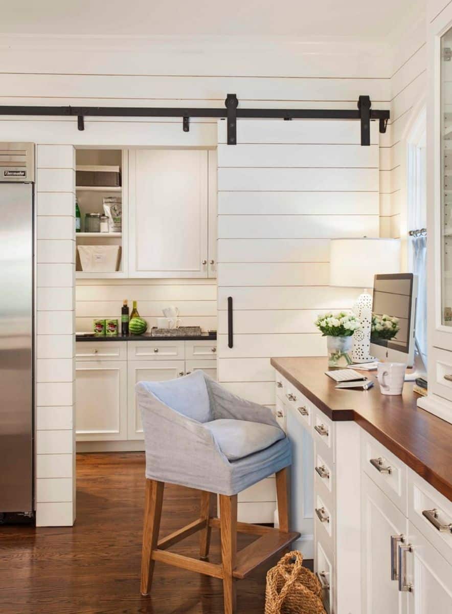 Kitchen office divided by a small barn door