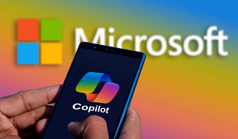 Persoană care ține un telefon negru cu simbolul Copilot pe ecran, cu Microsoft colorat pe fundal, pentru a ilustra cum Telegram integrează chatbot-ul Copilot