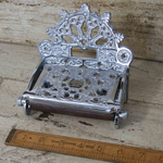 IRON RANGE Victorian Toilet Roll Holder Plated Chrome on Iron with Lid This Fixture has a duller Sheen than our Chrome on Brass.