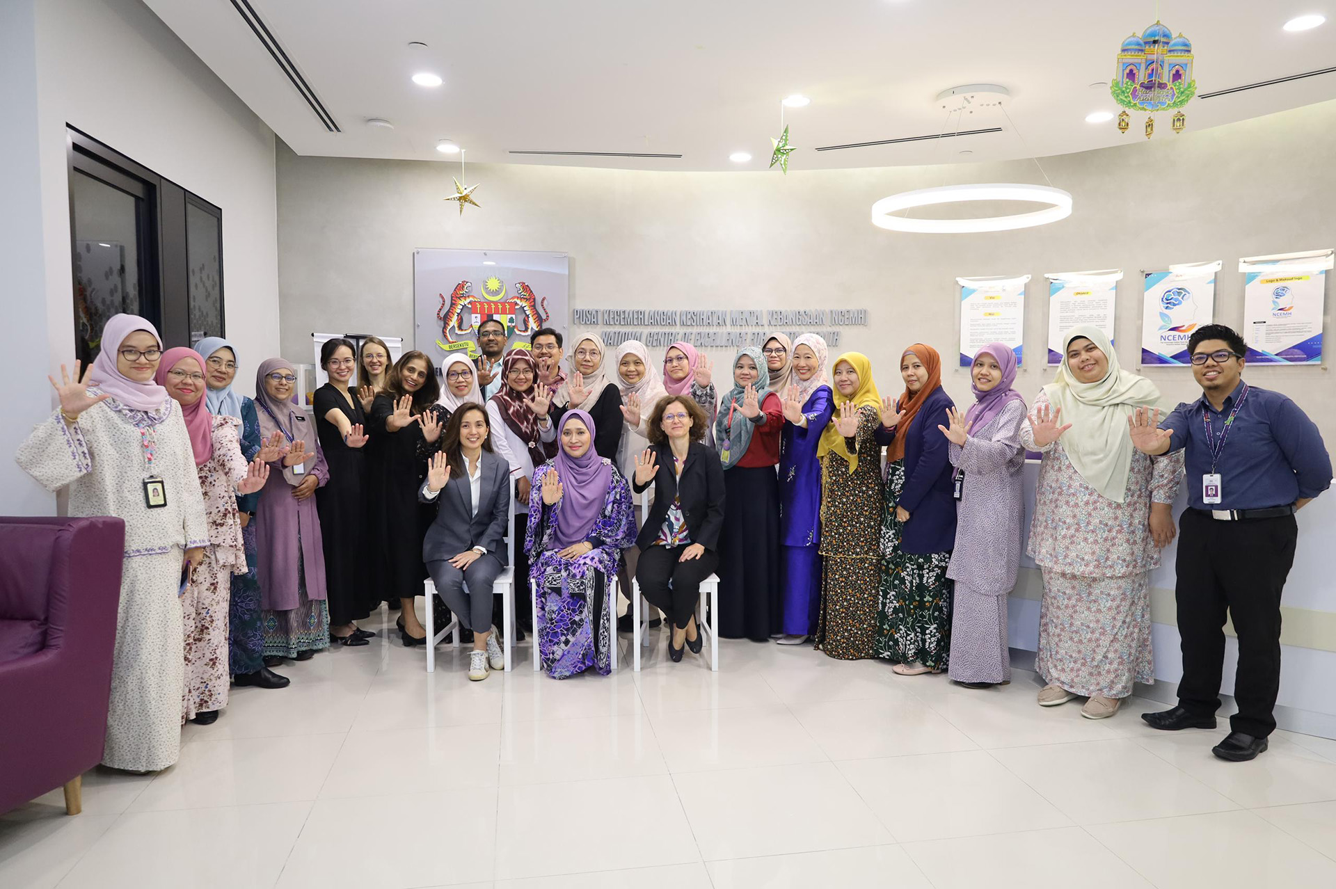 Group Picture of meeting participants at the NCEMH Lobby