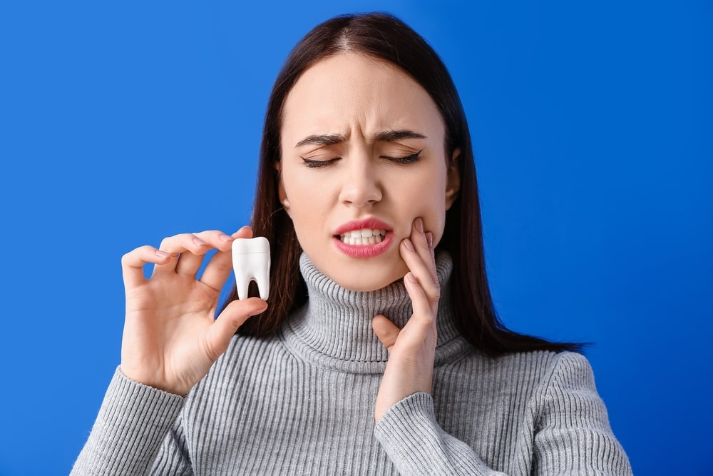 Understanding Tooth Pain: Reasons You Might Need a Root Canal or Other ...