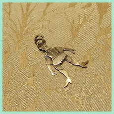 Tiny Silver Pendant Charm of an Articulated Jester Doll