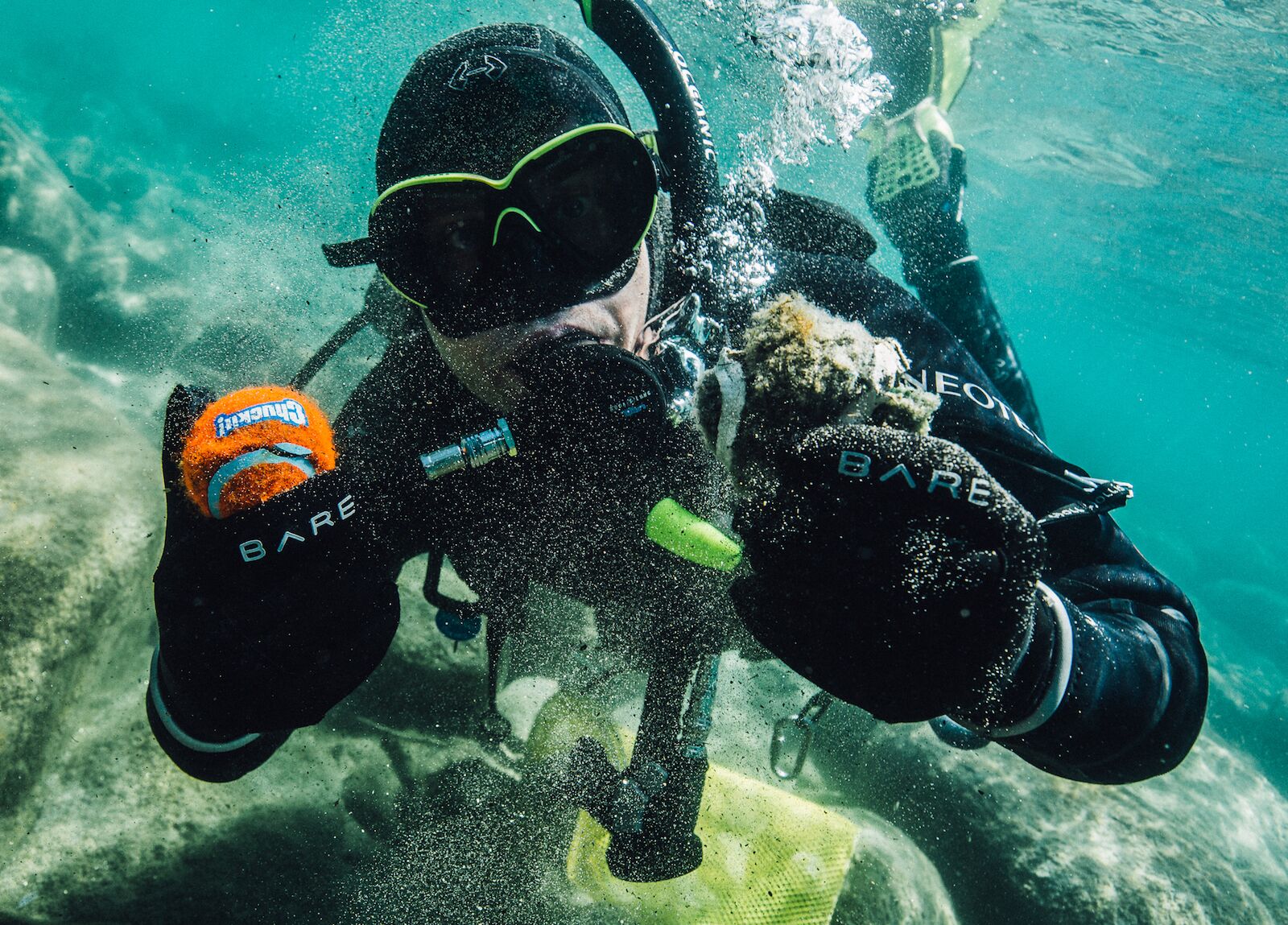 lake tahoe clean up diver with ball