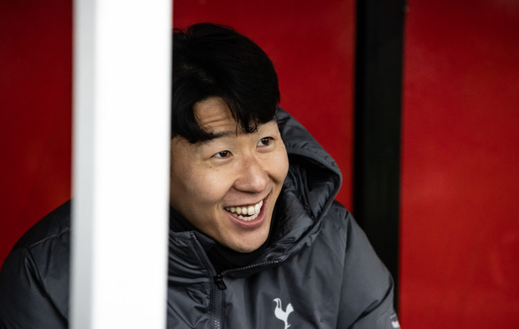 Tottenham Hotspur's Son Heung-Min looks on from the substitutes bench during the Emirates FA Cup Third Round match between Tamworth and Tottenham H...