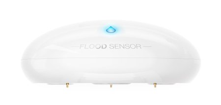 The white and round Fibaro flood sensor lies on a white background.