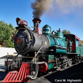 Narrow gauge, turquoise-colored steam engine with red cow catcher on the Tweetsie Railroad North Carolina by Carol M. Highsmith