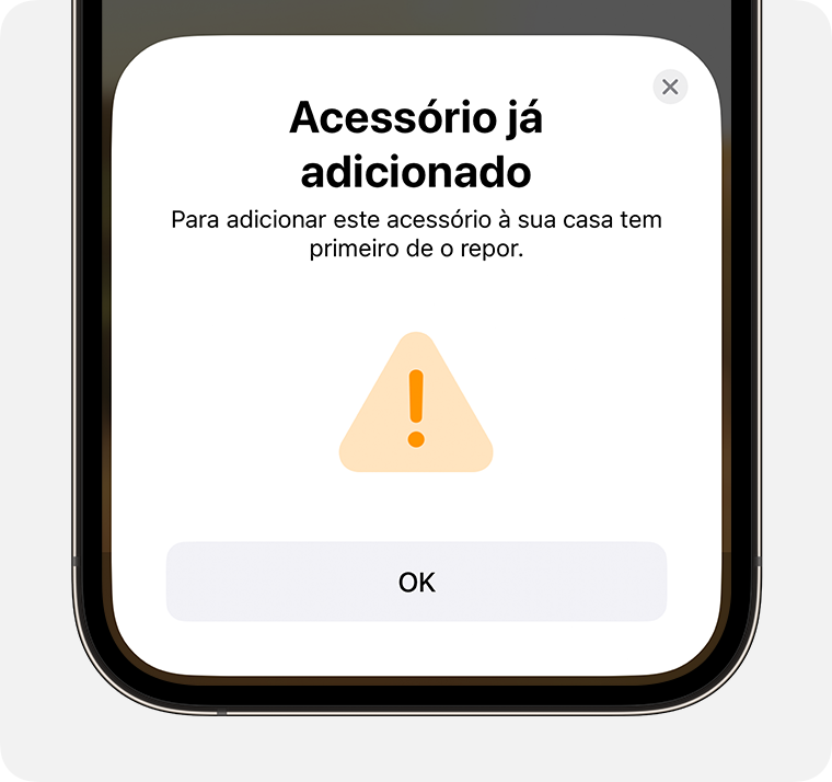 A mensagem a indicar que o acessório já foi adicionado com as instruções "Para adicionar este acessório à sua casa tem primeiro de o repor" é apresentada no iPhone