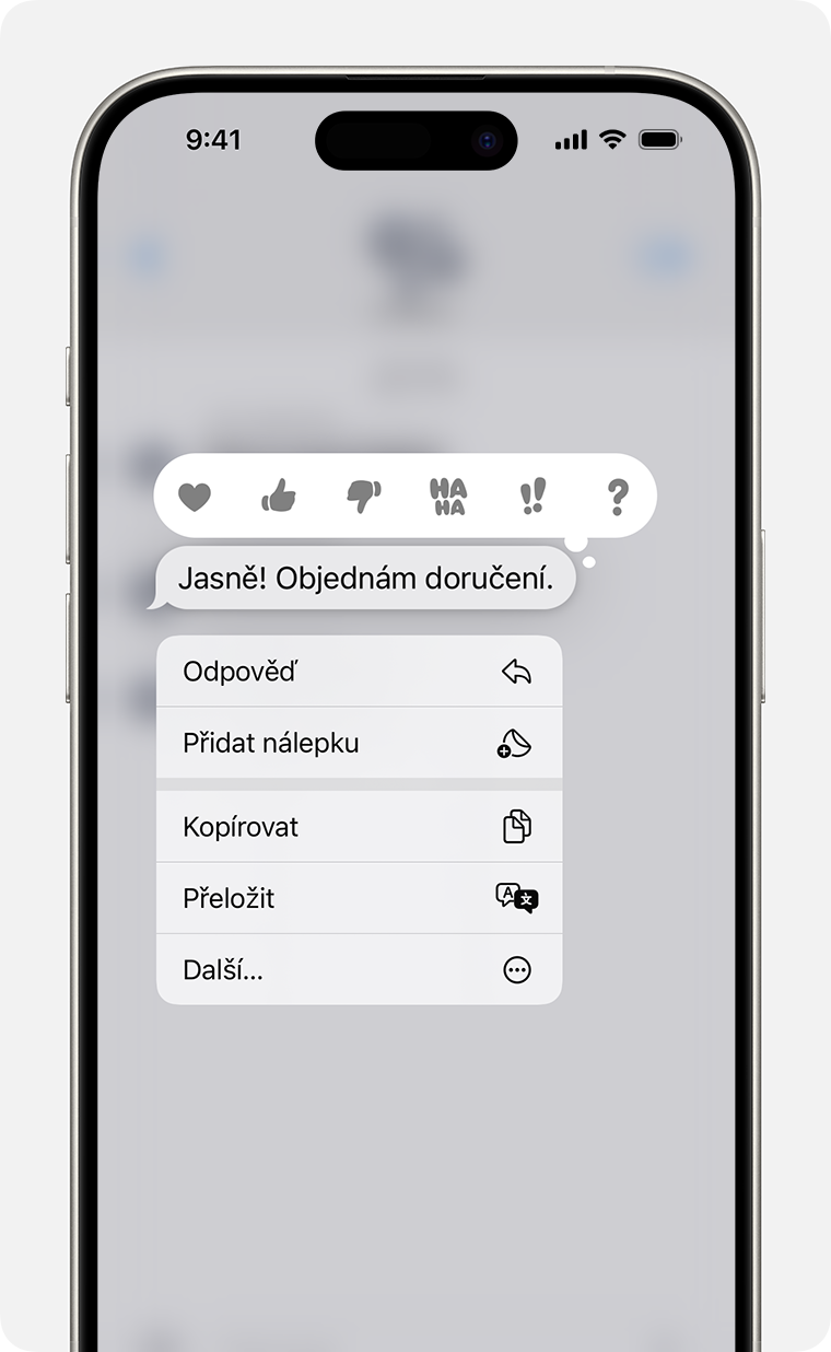iPhone zobrazující nabídku navazující reakce poté, co stisknete a podržíte bublinu zprávy kvůli odeslání navazující reakce