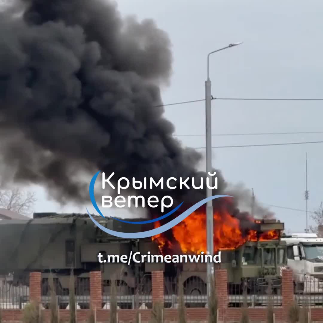 Part of S-300/S-400 complex caught fire at the highway near Saky