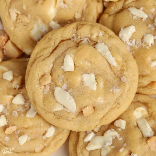 White chocolate macadamia nut cookies on a plate.