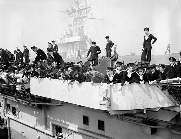 H.M.S. PUNCHER docking at Halifax, Nova Scotia, Canada, July 1945.