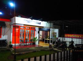 Pesona Orange Homestay, hotel in Padang