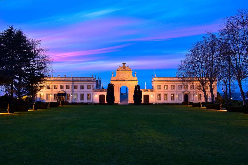 a large building with a large lawn in front of it at Valverde Sintra Palácio de Seteais - The Leading Hotels of the World in Sintra