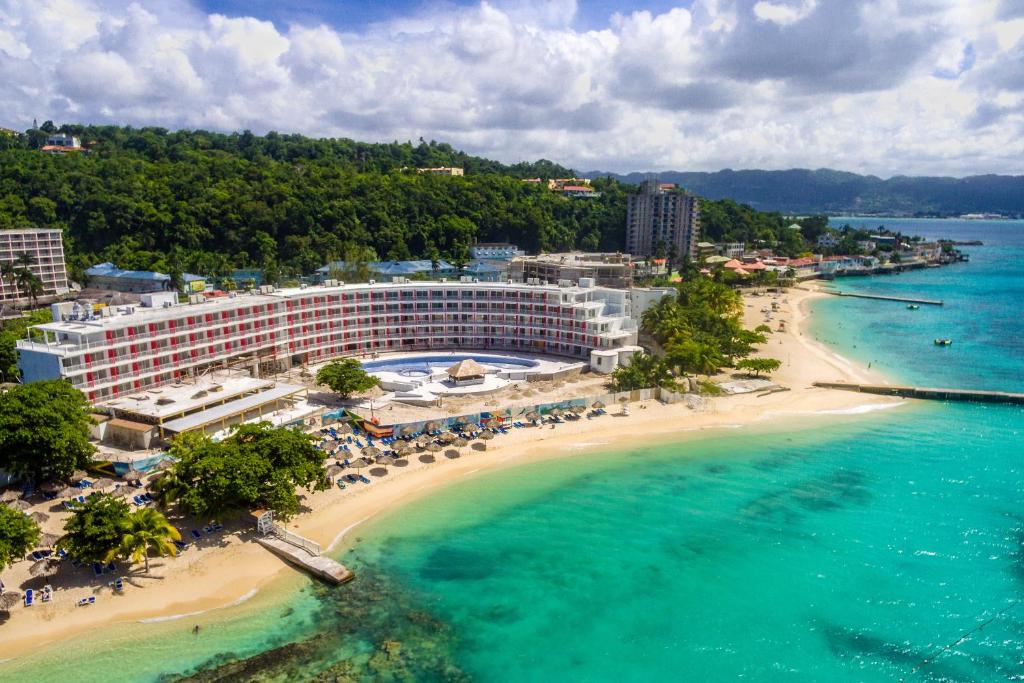 an aerial view of a resort and a beach at Grand Decameron Cornwall Beach, A Trademark All-Inclusive Resort in Montego Bay